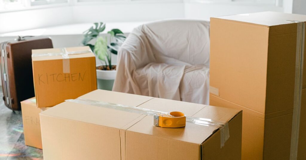 Moving boxes labeled and taped up.