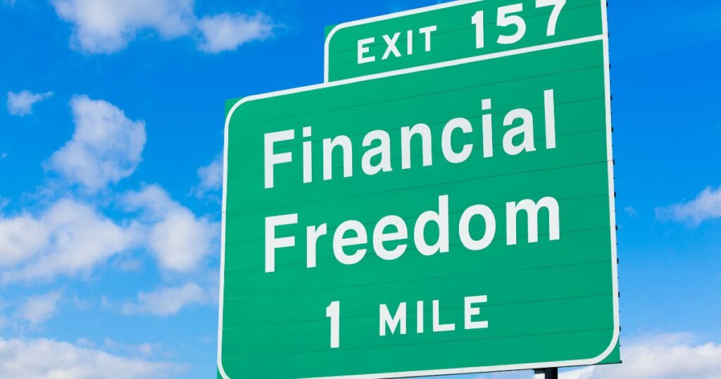 Highway sign indicating Financial Freedom is nearby with passive income.
